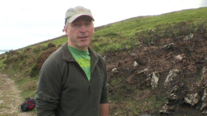 Vince McAlinden VSG standing infront of a grassy bank.