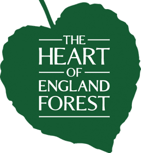 Heart of England Forest logo (text on a green leaf shaped like a heart)